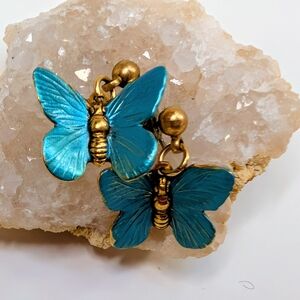 Stunning vintage iridescent glass earrings with a bold round silhouette and incr